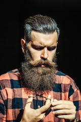 Young man with scissors