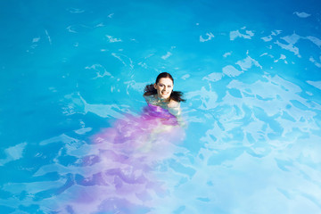 pretty sexy woman in swimming pool