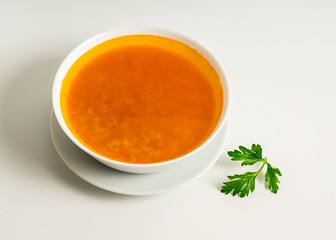delicious lentil soup with parsley isolated