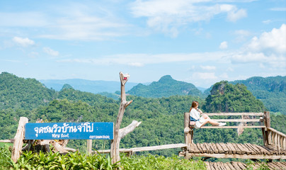 Fototapeta premium Asian woman at viewpoint 