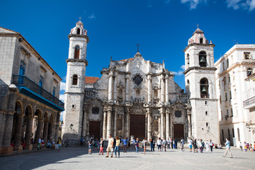 Fototapeta na wymiar Cathedral San Cristobal on a central square of Havana city at summer sunny day