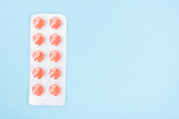 One full blister with red pills