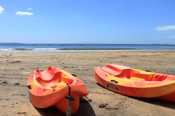 kayaks lying on the beach