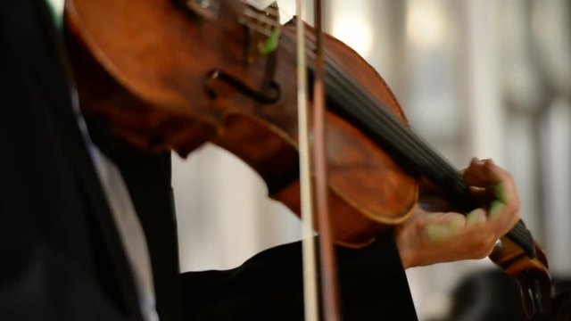 Violin close up in the hands of a classical concert violinist