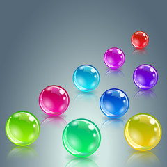 Glossy colored balls with reflection