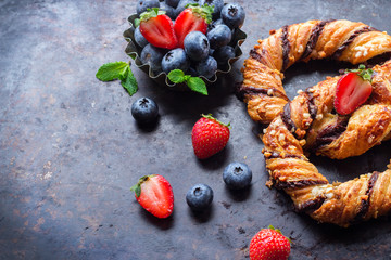 Homemade pretzel with chocolate and crunchy almonds