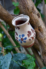 Hanging old ceramic jug