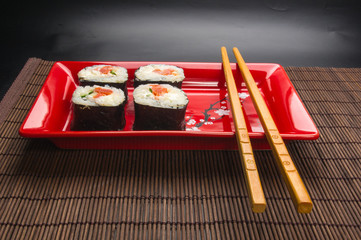 still life - set the rolls on a red plate