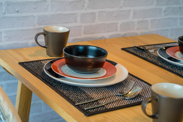 Restaurant table with empty glasses and plates Japanish style