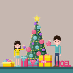 Happy girl and boy decorating the Christmas tree at home.