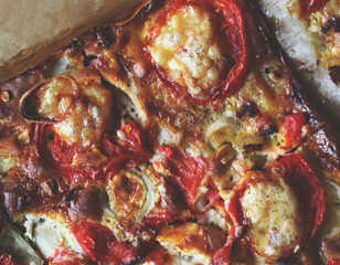 Rustic pizza with tomatoes