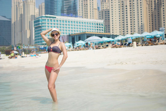 young girl on the beach in Dubai, Dubai Marina Bay