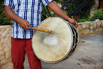 Man Playing a Tabl