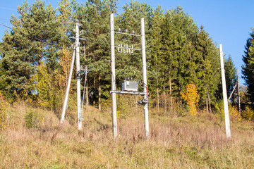 Electric pole with a transformer
