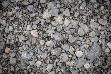 Ground with stones
