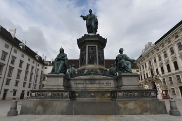 Fototapeta na wymiar Emperor Franz I statue front of Amalienburg in Hofburg Palace