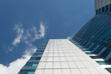 Fototapeta na wymiar The Modern building on blue sky background