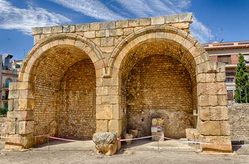 Two semi circular arches of the roman forum remains in Tarragona, Spain