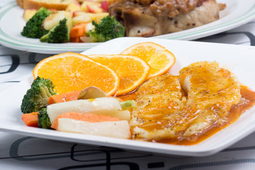 Dory fish steak with orange sauce