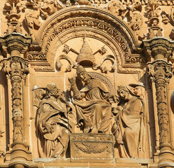 Facade of Salamanca University - Pope and two Cardinals