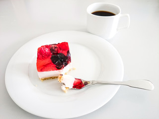 Cream cake with strawberries, raspberries