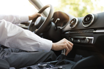 Businessman driving to work