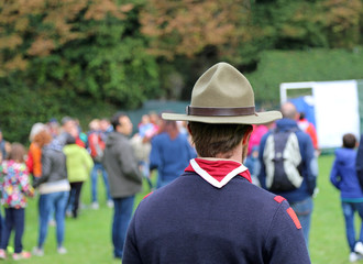 scout leader at international gathering in uniform with campaign