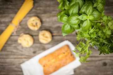 Fresh herbs on old wood background