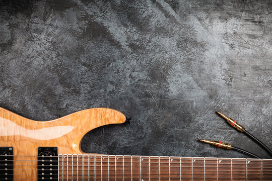Electric guitar on grey background