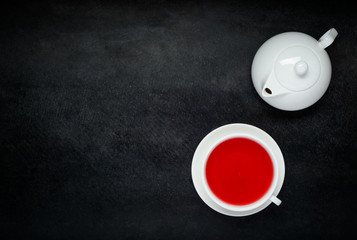 Red Fruit Tea with White Teapot and Copy Space