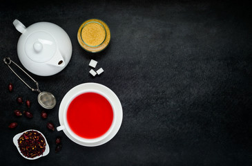 Obraz na płótnie Canvas Red Tea with Dried Fruits and Teapot on Copy Space