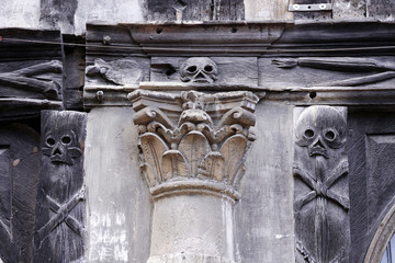 carved skulls at ancient ossuary