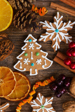 christmas gingerbread tree cookie with spices and decorations close up