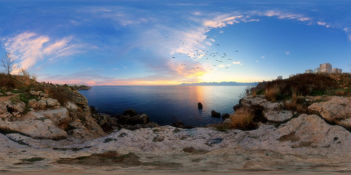 360 degree spherical panorama from Turkey, Antalya. Evening landscape with the sea, mountains, cliffs, birds and city in the background.
