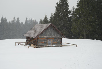 View of the mountain hut in snowy day