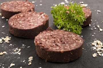 home made irish black pudding with oatmeal and parsley