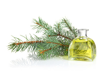Obraz na płótnie Canvas Bottle of coniferous essential oil and branch isolated on white