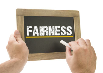 Fairness - Hand writing on chalkboard