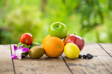 Citrus fruits on a brown wooden table