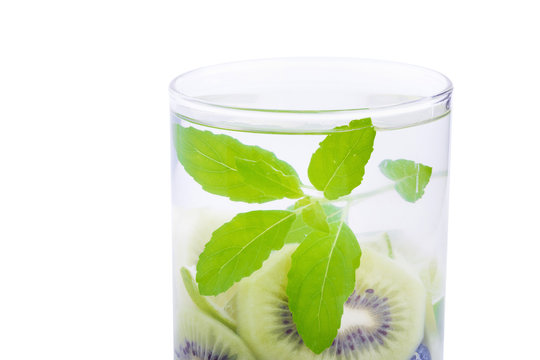 Detox water with Blueberries, kiwi and basil leaves.