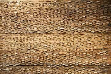 A threshing board (an obsolete farm implement used to separate cereals from their straw)