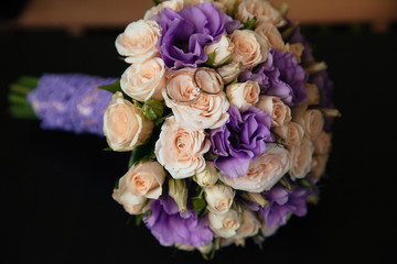 Wedding flowers bouquet on a dark background