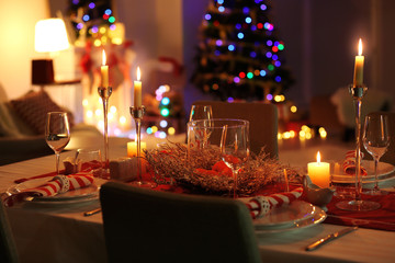 Close up view of table served for Christmas dinner, on blurred background