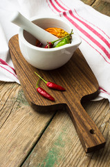 Chilli pepper on rustic kitchen
