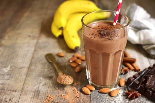 Homemade chocolate banana smoothie in a glass.