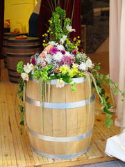 Wooden barrel with flower decoration