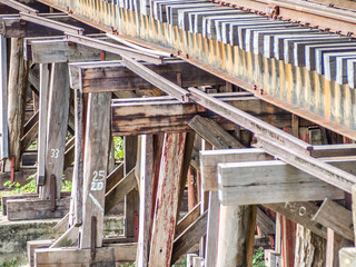 Railway trains track on wooden bridge