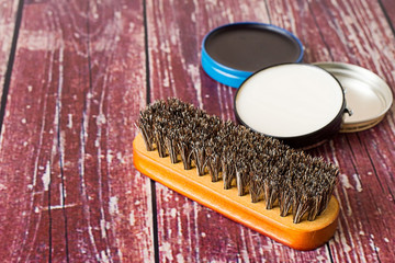  Brush for cleaning shoes and cream .   Brush for cleaning shoes and two jars of cream on the old...