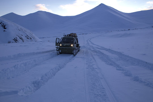 Off-road in the snowy mountains. Moma Ridge, Yakutia, Russia.
