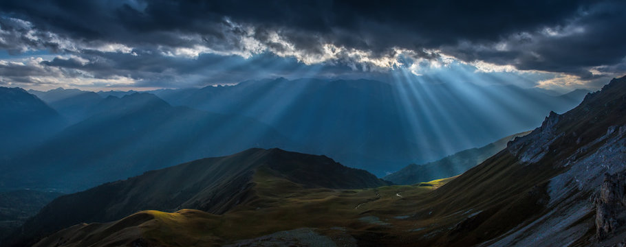 Mountain valley in beams of evening sun. Caucasus mountains.